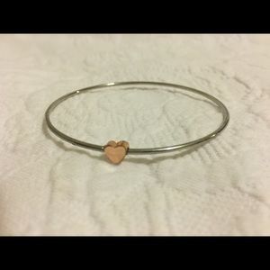 NWOT silver metal bangle with rose gold heart